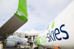 Image of United Eco-Skies aircraft and fuel truck loading biofuel