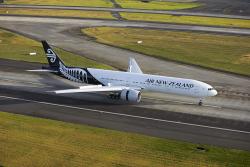 Air New Zealand airplane taking off runway