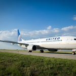 Image of a United Boeing 737 plane on the runway
