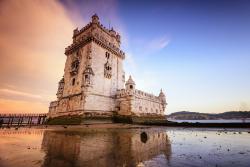 Exterior of Lisbon castle on water.