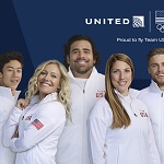 6 Olympic Athletes in white jackets with United logo
