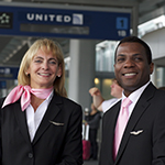Flight attendants wearing pink