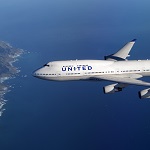 Boeing 747-400 flying towards land
