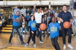 United employees play basketball with Warriors players, Zaza Pachulia and Shaun Linvingston
